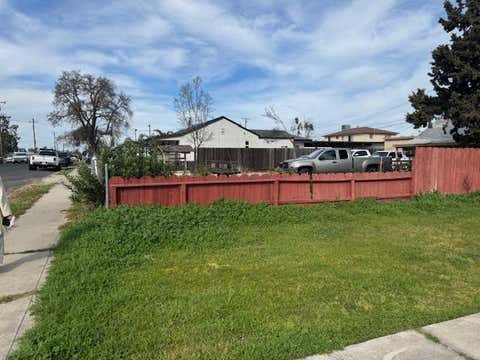Photo of 322 Poplar Avenue, MANTECA, CA 95336 (MLS # ML82049616)