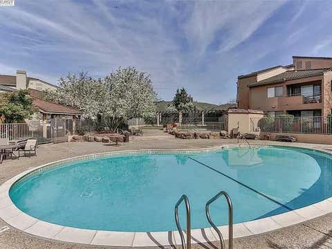 Tiny photo for 39078 Guardino Drive #107, Fremont, CA 94538 (MLS # ML82053900)