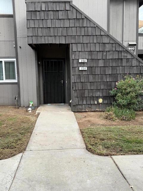 Photo of 4860 E Lane Avenue #104, FRESNO, CA 93727 (MLS # ML82026618)
