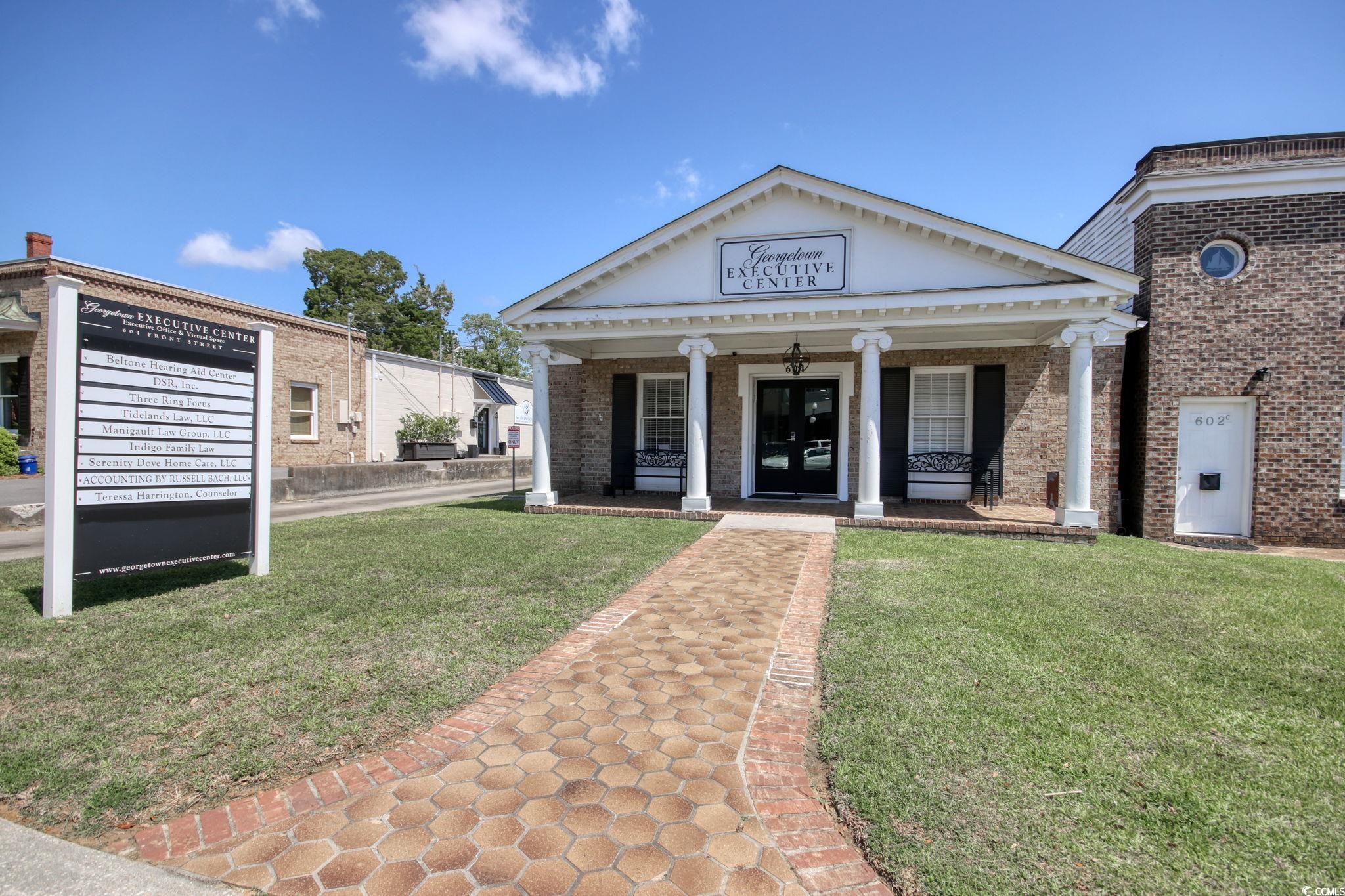 View of front of home featuring a front yard and a