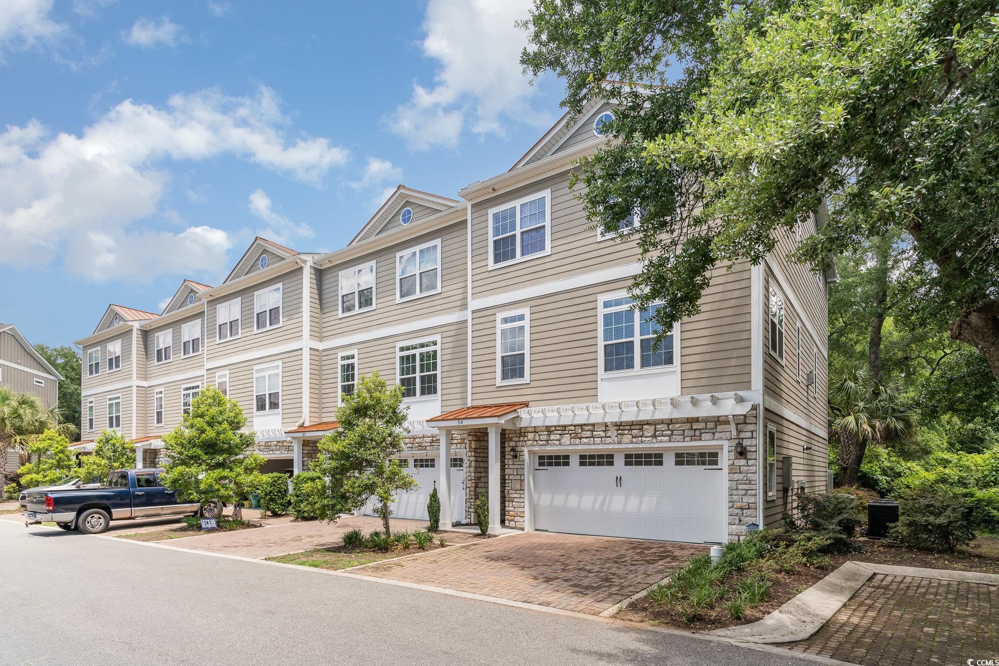 Photo 3 of 39 of 54 Oyster Bay Dr. 201 townhome