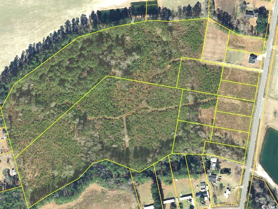 Aerial map of property and surrounding area with p