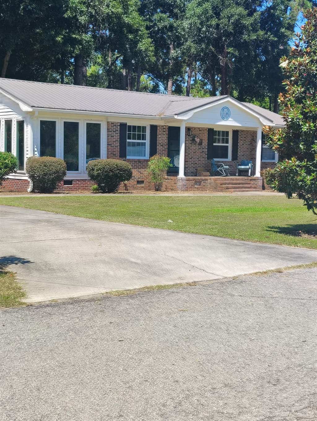 Photo of 558 Elm St, Fair Bluff, SC 28439 (MLS # 2621120)