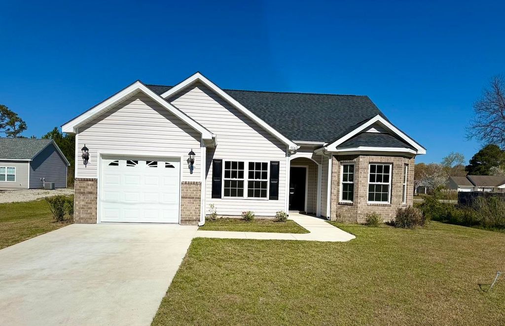 Photo of 908 Sandridge Rd, Little River, SC 29566 (MLS # 2607212)