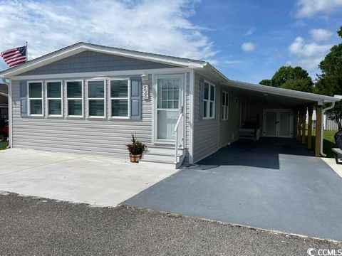 Photo of 469 Sandpebble Dr, Surfside Beach, SC 29575 (MLS # 2515817)