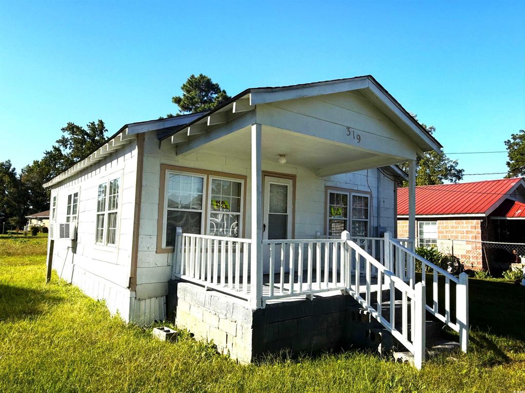 Photo of 319 Scott St, Lake City, SC 29560 (MLS # 2525536)