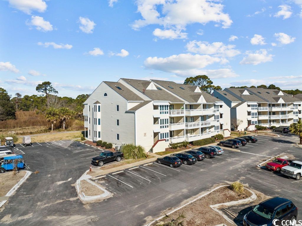 Photo of 1100 Possum Trot Rd #F-215, North Myrtle Beach, SC 29582 (MLS # 2426088)