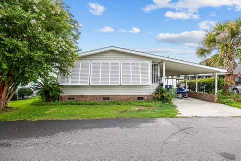 Photo of 1732 East Lake Dr, Surfside Beach, SC 29575 (MLS # 2613405)