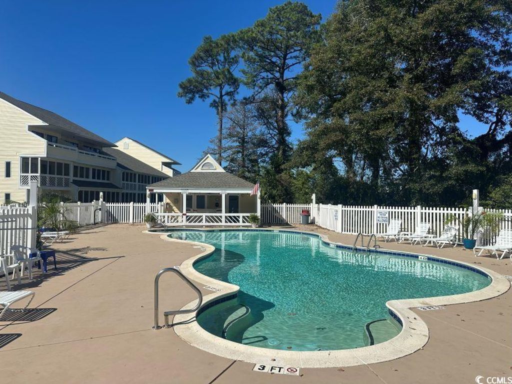 Photo of 1100 Possum Trot Rd #E-136, North Myrtle Beach, SC 29582 (MLS # 2525271)