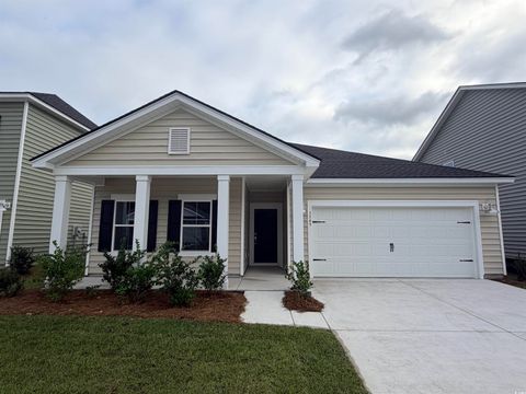 Photo of 3349 Wood Stork Dr, Ocean Isle Beach, NC 28469 (MLS # 2525027)