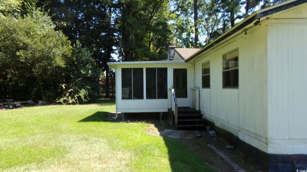 Photo of 90 Oak Tree St, Hallsboro, NC 28442 (MLS # 2524234)