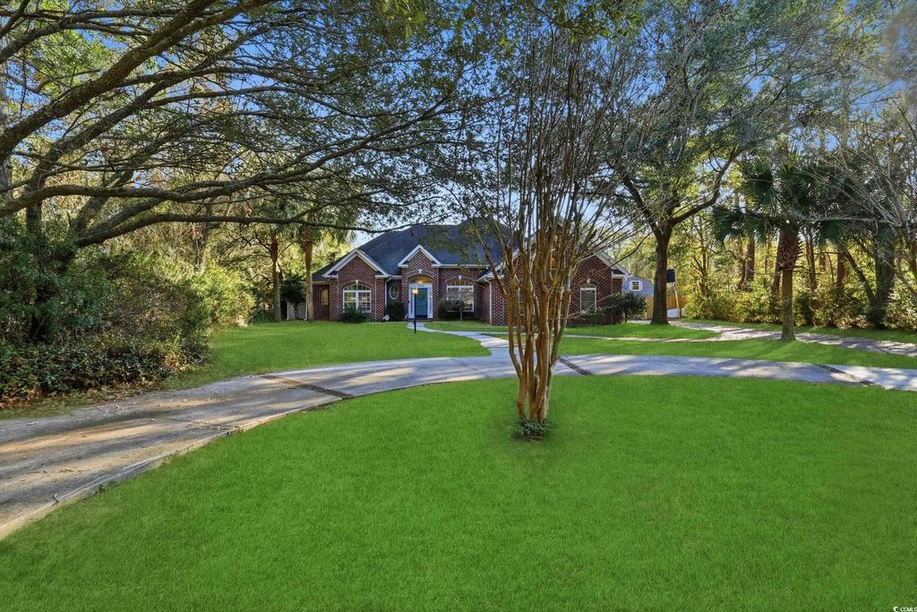 Photo of 1203 Crooked Oak Dr, Pawleys Island, SC 29585 (MLS # 2600739)