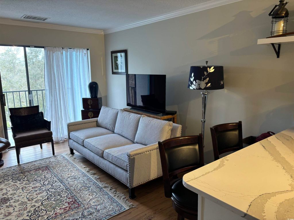 Photo of 5001 Little River Rd #E-504, Myrtle Beach, SC 29577 (MLS # 2524784)