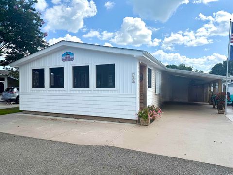 Photo of 465 Sandpebble Dr, Surfside Beach, SC 29575 (MLS # 2517087)