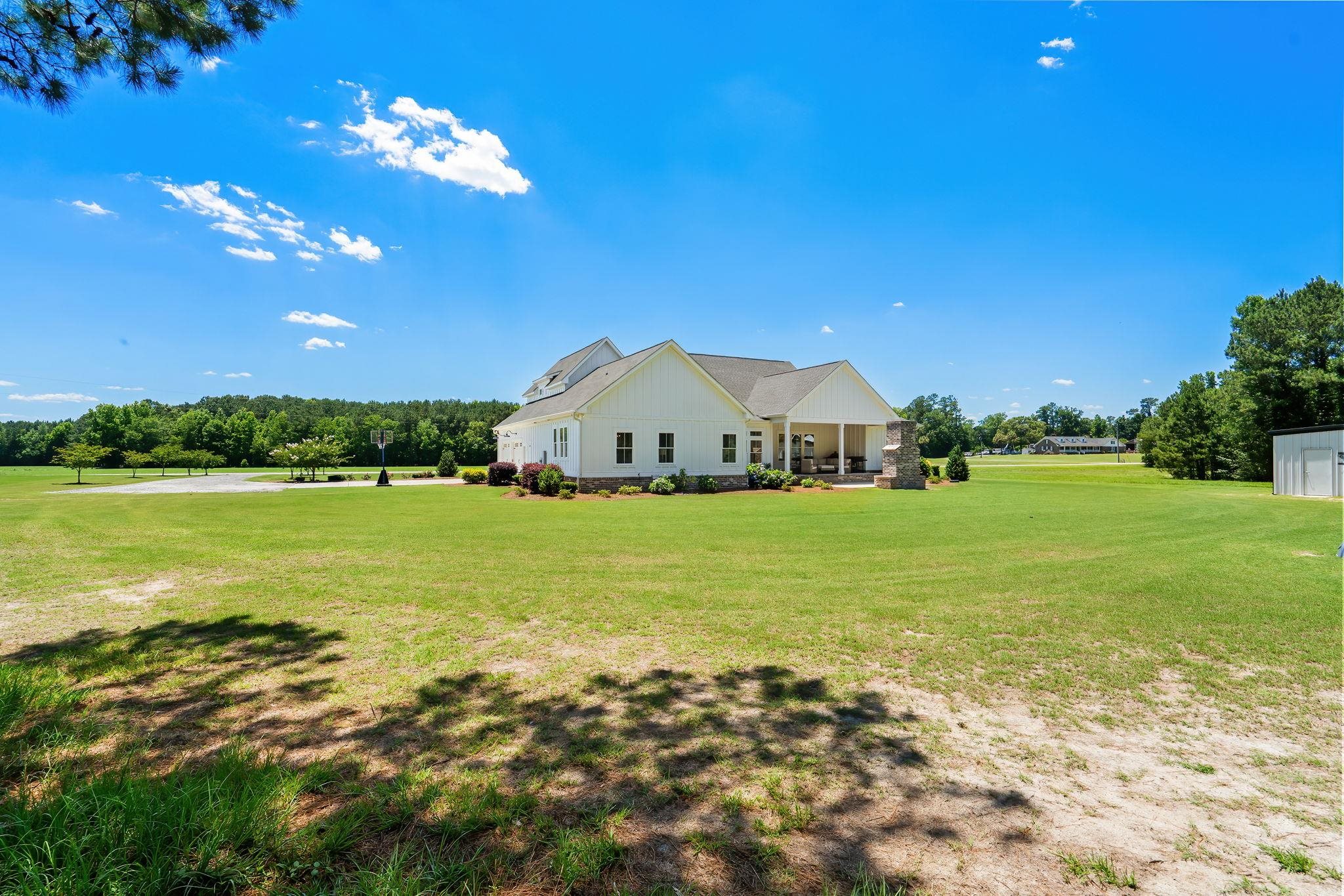 Experience elevated farmhouse living in this exceptional 4 bedroom, 3. – image 62