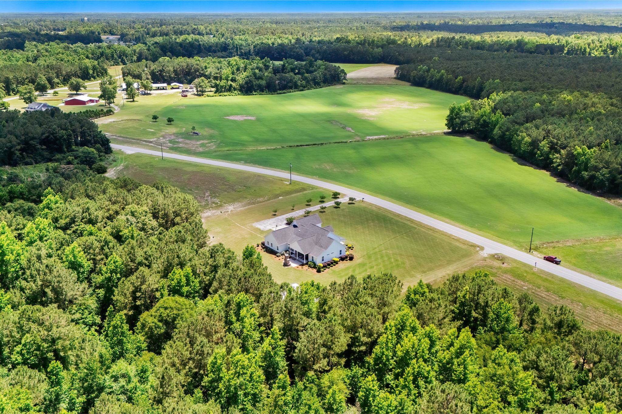 Experience elevated farmhouse living in this exceptional 4 bedroom, 3. – image 69