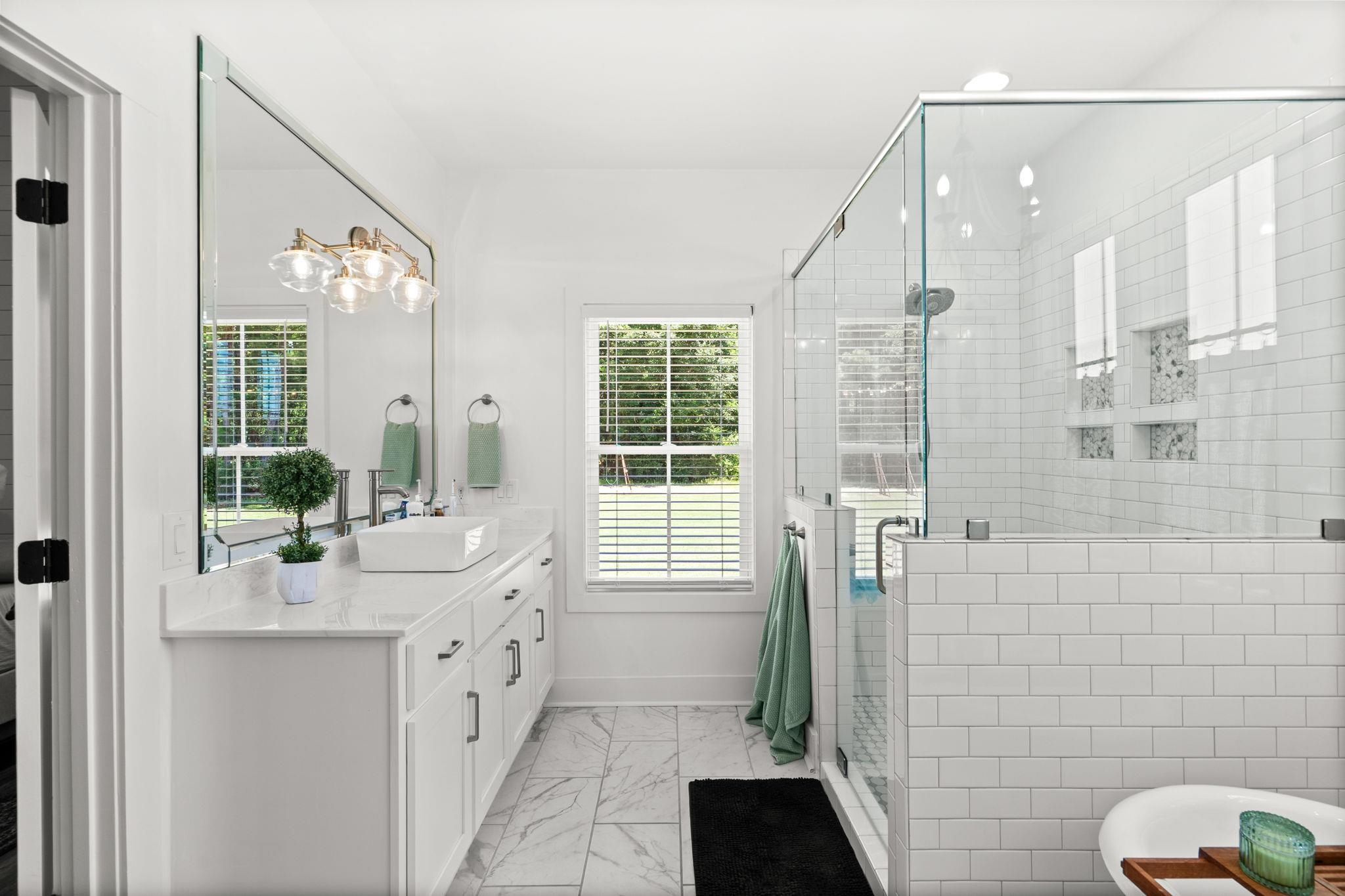 Experience elevated farmhouse living in this exceptional 4 bedroom, 3. – image 28