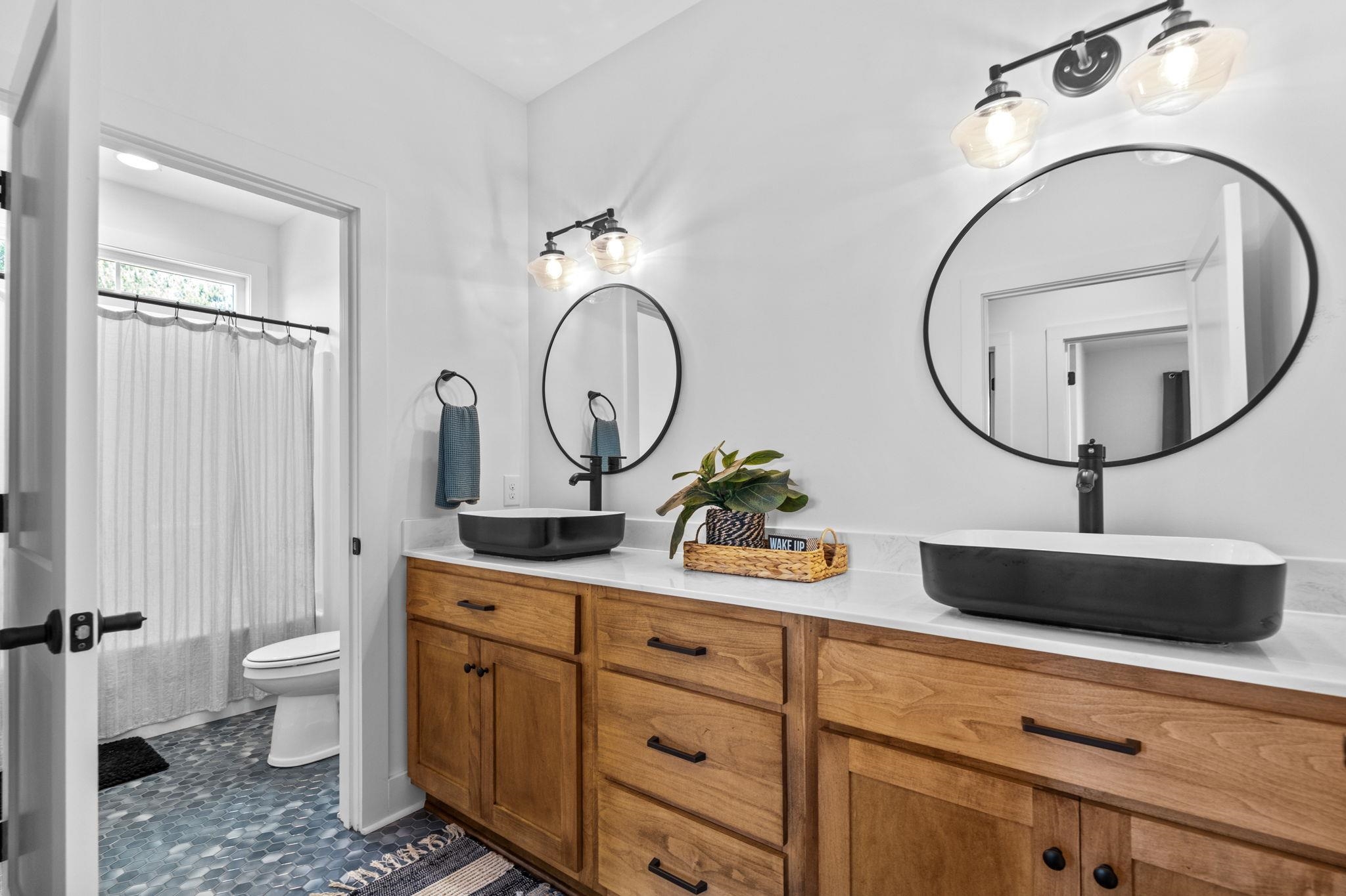Experience elevated farmhouse living in this exceptional 4 bedroom, 3. – image 42