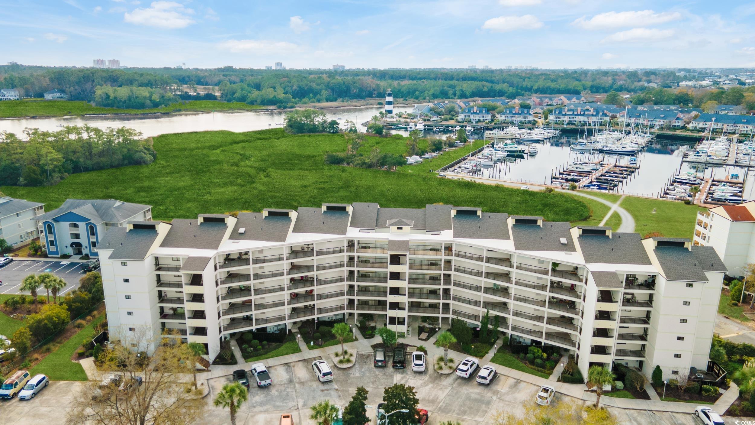 Bird's eye view of numerous boat docks and a nearb