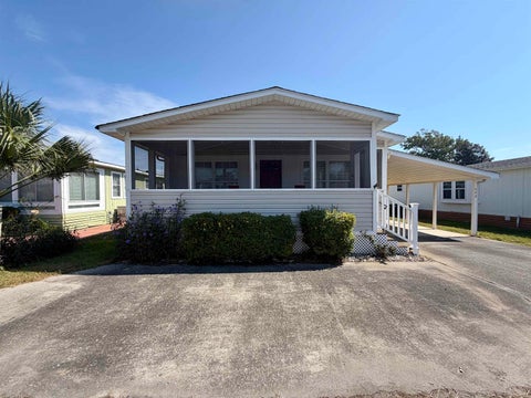 Photo of 440 Pampas Dr, Surfside Beach, SC 29575 (MLS # 2623415)