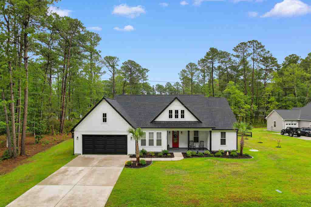 Photo of 464 NW Boundary Loop Rd, Calabash, NC 28467 (MLS # 2618578)
