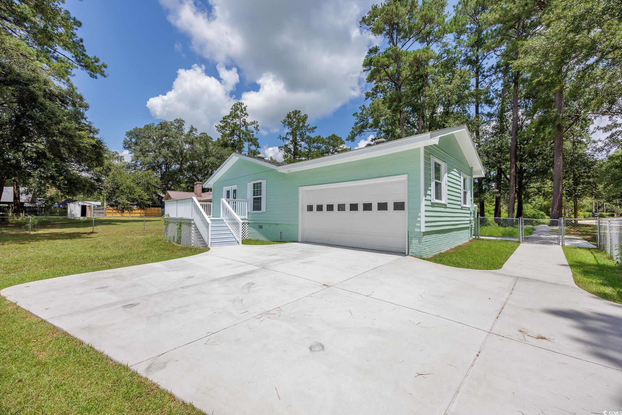 403 McQueen St.