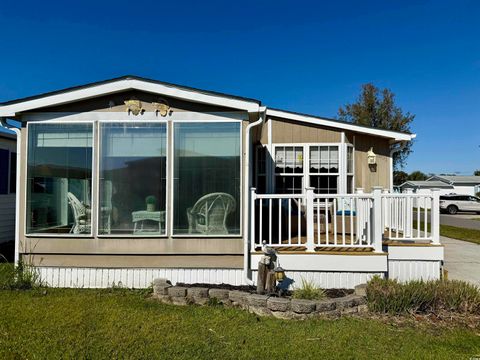 Photo of 1801 East Lake Dr, Surfside Beach, SC 29575 (MLS # 2526412)