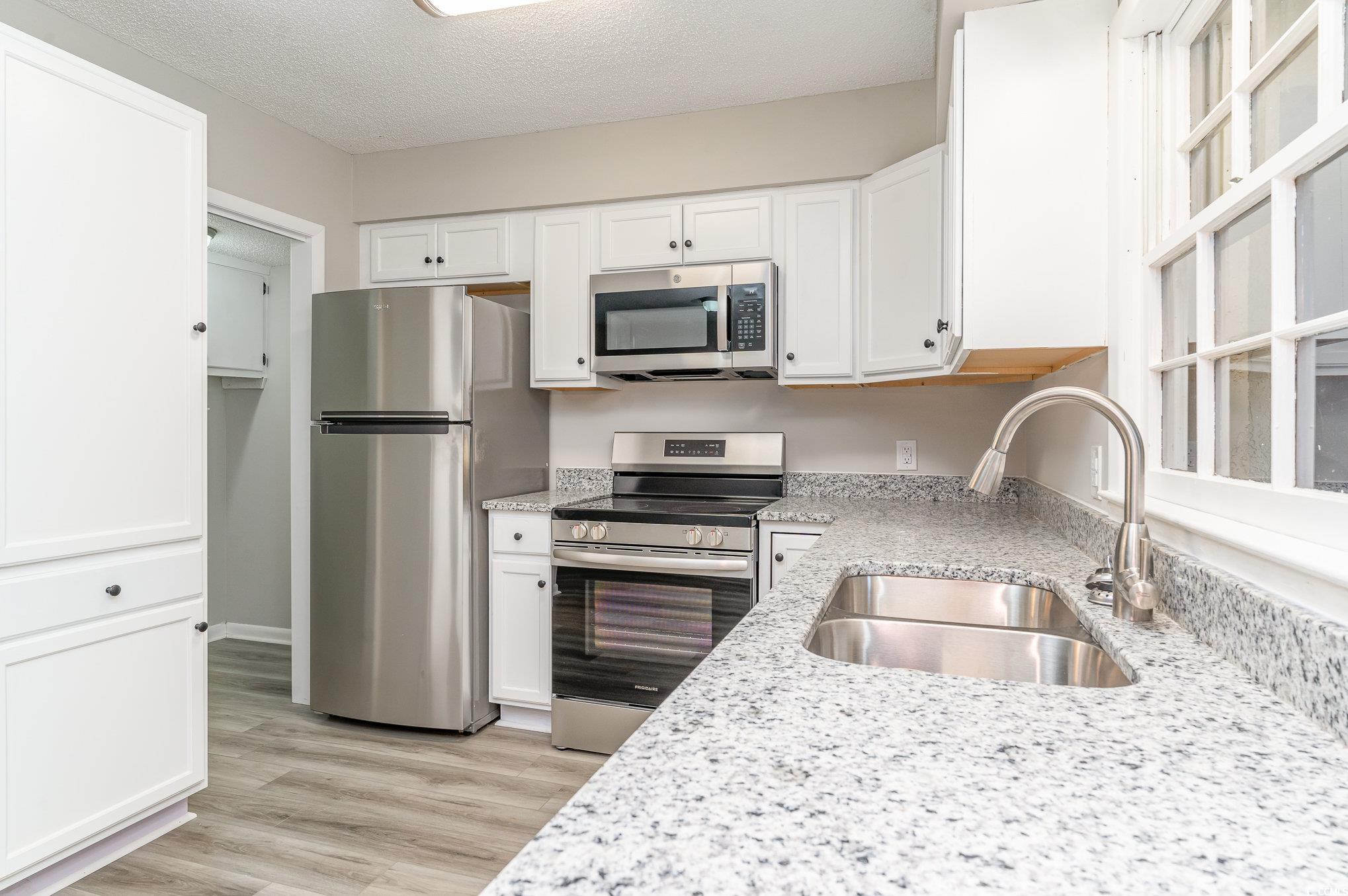 Photo 5 of 33 of 315 73rd Ave. N C townhome