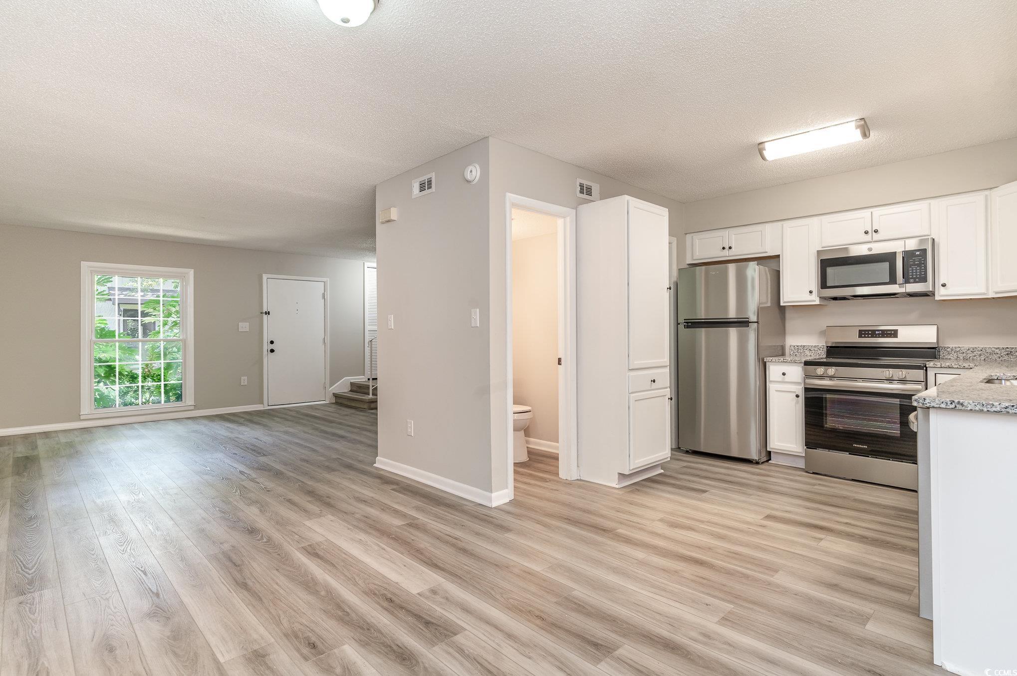 Photo 2 of 33 of 315 73rd Ave. N C townhome