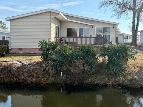 Photo of 426 East Lake Dr, Surfside Beach, SC 29575 (MLS # 2603845)