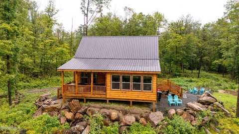 Photo of 122 Buttermilk Hill Road, Wells, NY 12190 (MLS # 202623109)