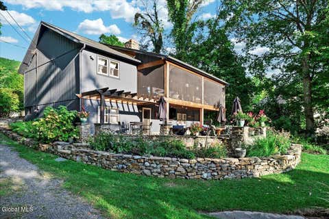 Photo of 83 Pilot Knob Road, Kattskill Bay, NY 12804 (MLS # 202622770)