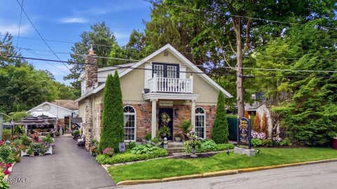 Photo of 15 West Street, Lake George, NY 12845 (MLS # 202624082)