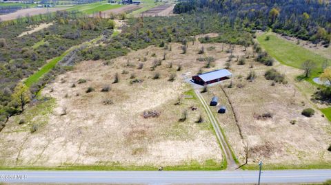 Photo of 557 Old Sharon Road, Canajoharie, NY 13317 (MLS # 202615976)