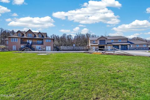 Photo of 242 MacPhail Road, Canajoharie, NY 13317 (MLS # 202614866)