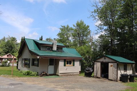 Photo of 103 Seven Oaks Rd Road, Caroga Lake, NY 12032 (MLS # 202614432)