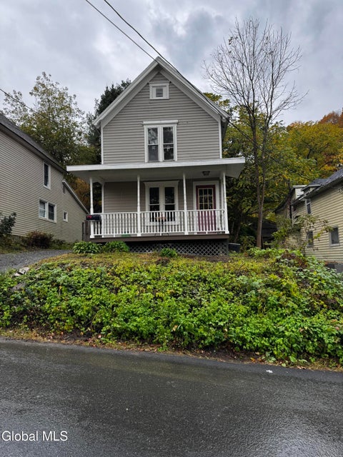 Photo of 57 McKinley PL, Gloversville, NY 12078 (MLS # 202628161)