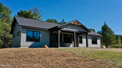 Photo of 1540 River Road, North Creek, NY 12853 (MLS # 202527553)
