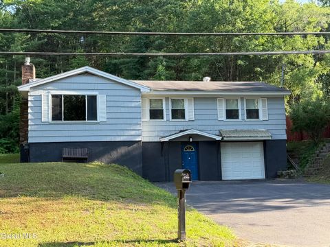 Photo of 409 W Fulton Street Extension, Gloversville, NY 12078 (MLS # 202621490)
