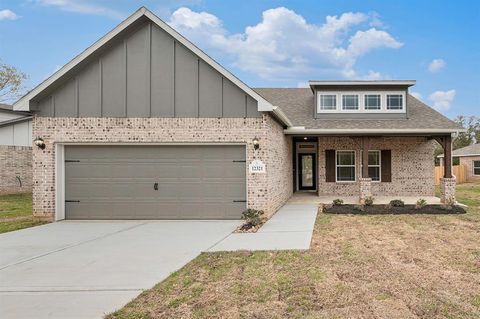 Photo of 11024 Ondrea Ln, Willis, TX 77318 (MLS # 72028627)