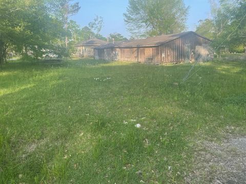 Photo of 9102 Hueni Road, Houston, TX 77365 (MLS # 87655608)