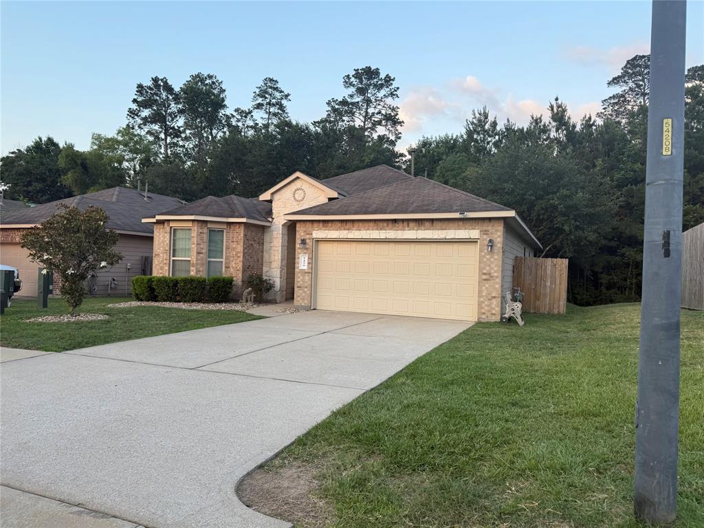9459 E Woodmark, Conroe, Texas image 2