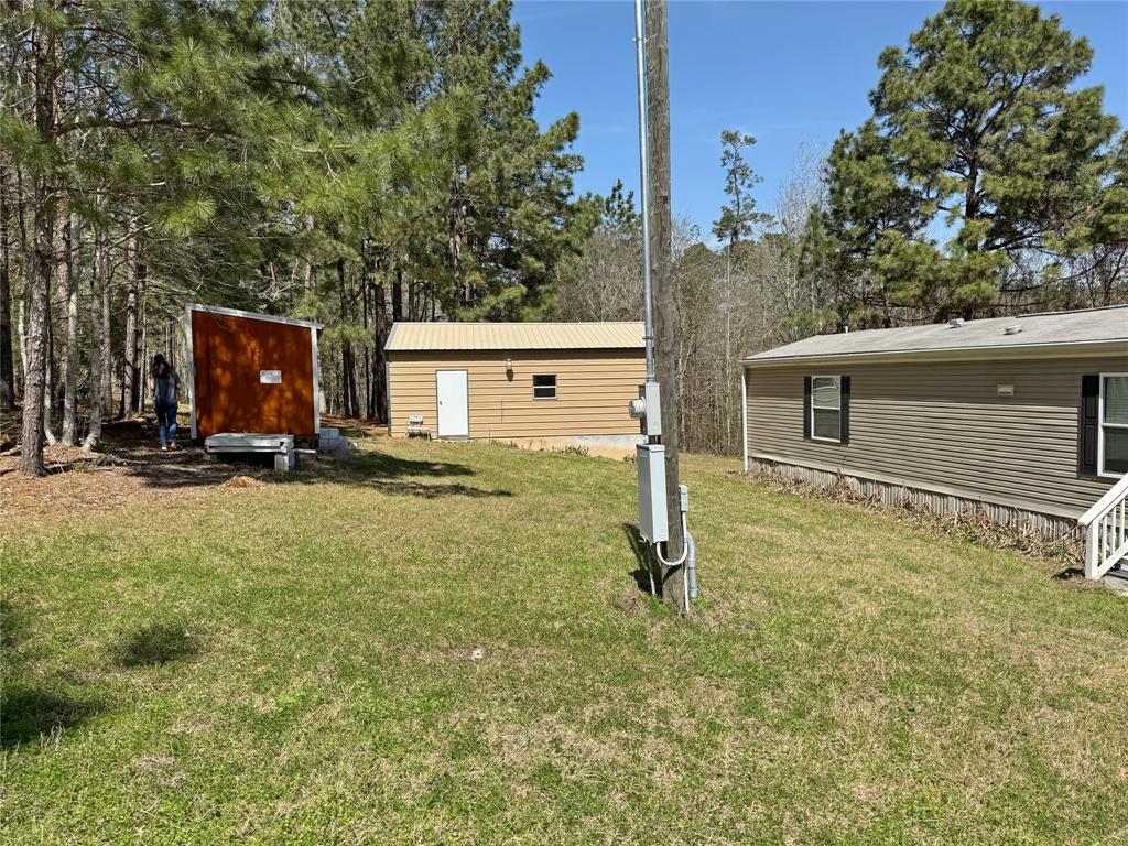 600 Saddle Surrey Road, Coldspring, Texas image 1