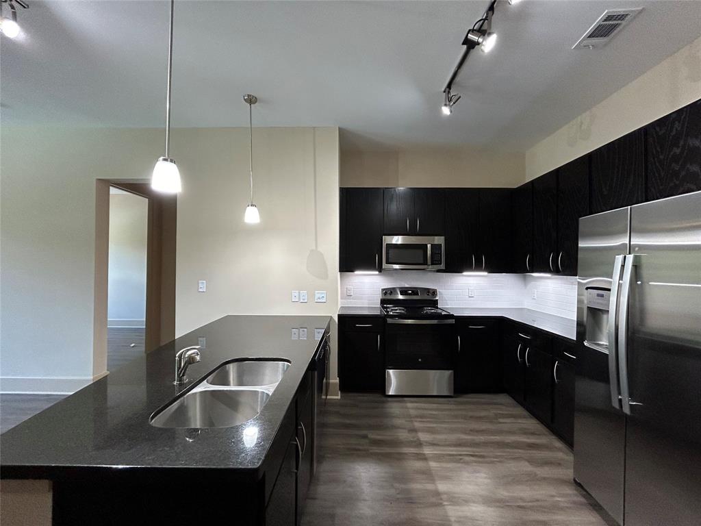 230 T C Jester Boulevard 443
