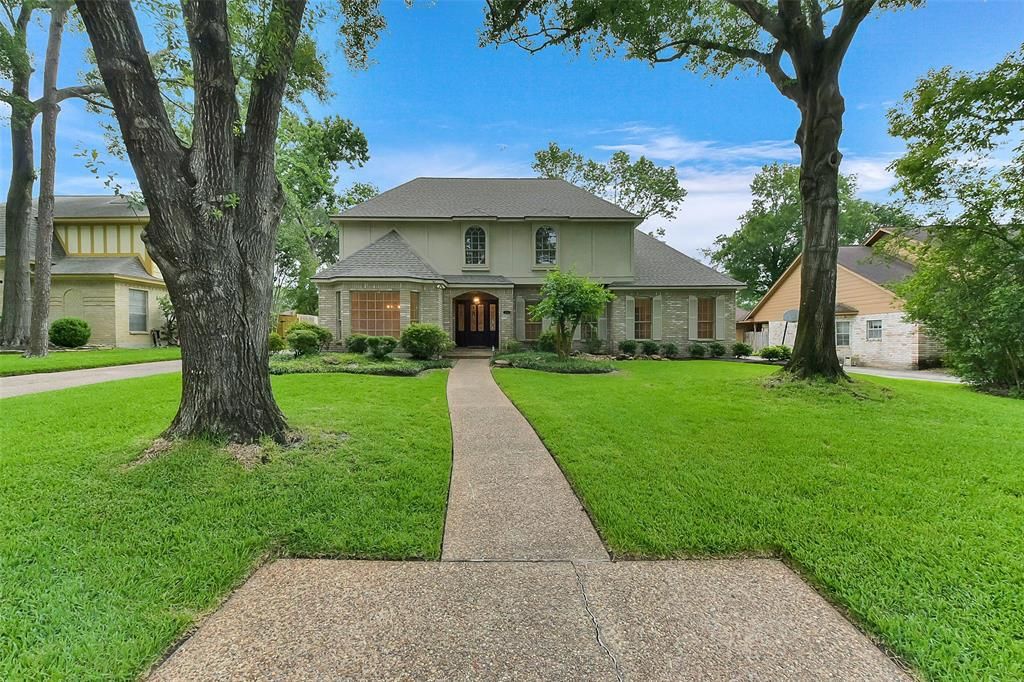 Photo of 2714 Rustic Woods Drive, Houston, TX 77345 (MLS # 39609172)