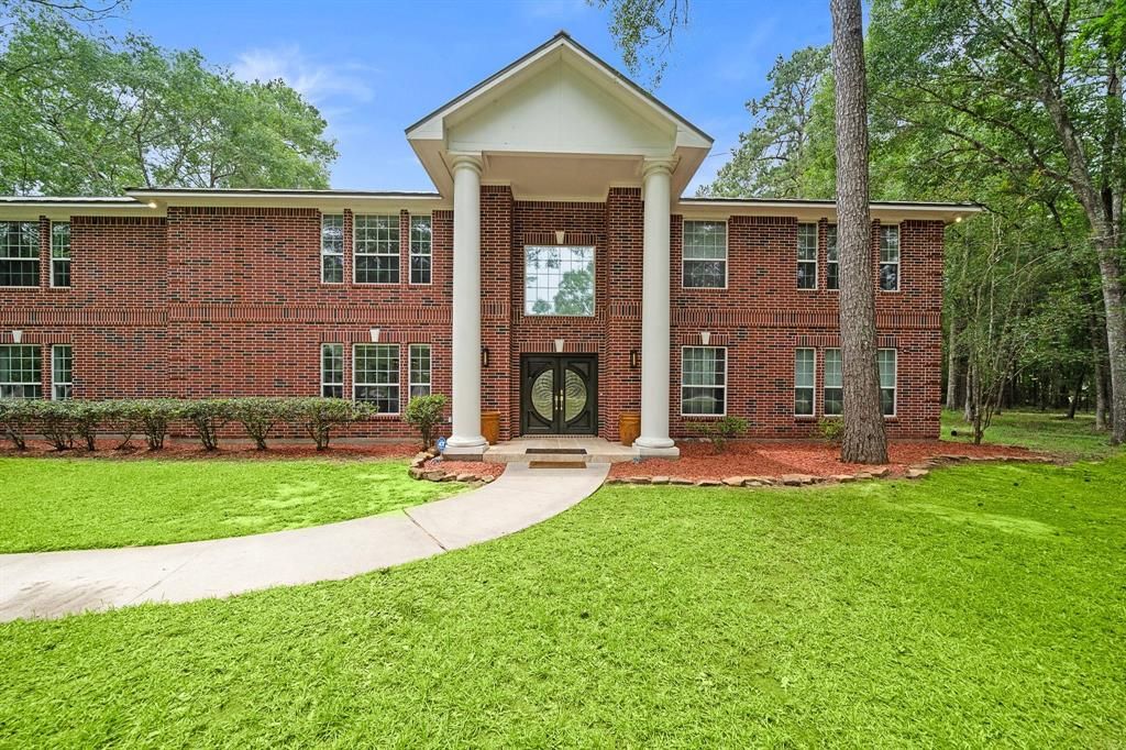Photo of 21992 Blazing Trail, New Caney, TX 77357 (MLS # 21780987)