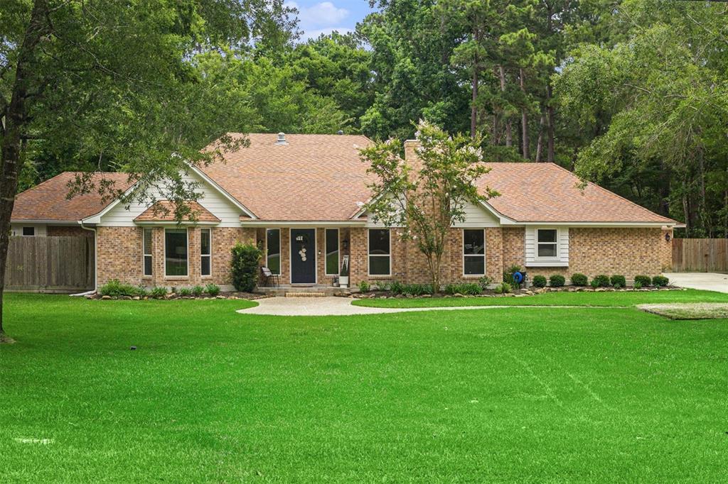 8 Wind River Court, Conroe, Texas image 1