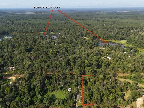 Photo of TBD Ole Long Pull Road, Livingston, TX 77351 (MLS # 85464065)