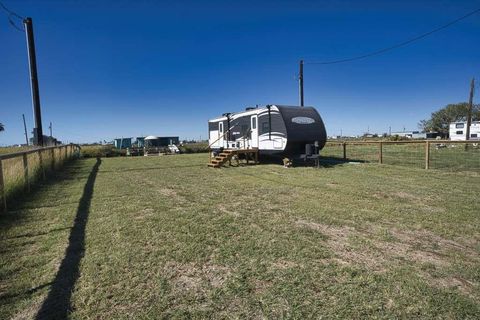 Photo of 215 Hall Avenue, Sargent, TX 77414 (MLS # 44265917) Photo of 215 Hall Avenue, Sargent, TX 77414 (MLS # 44265917)