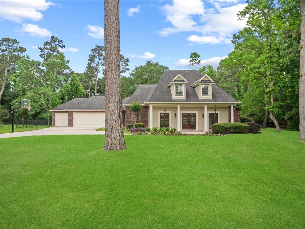 9810 Clubhouse Circle, Magnolia, Texas image 1